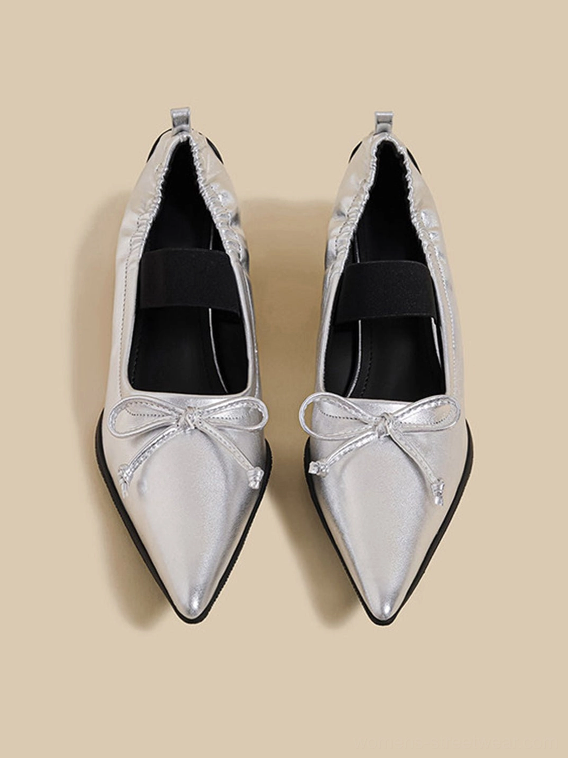 Silver bow pointed-toe Mary Jane mules with smooth metallic finish elastic strap and sculpted heels