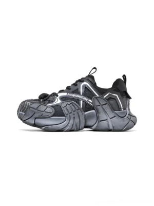 Black silver cage panel chunky platform sneakers side three quarter studio view with segmented sole