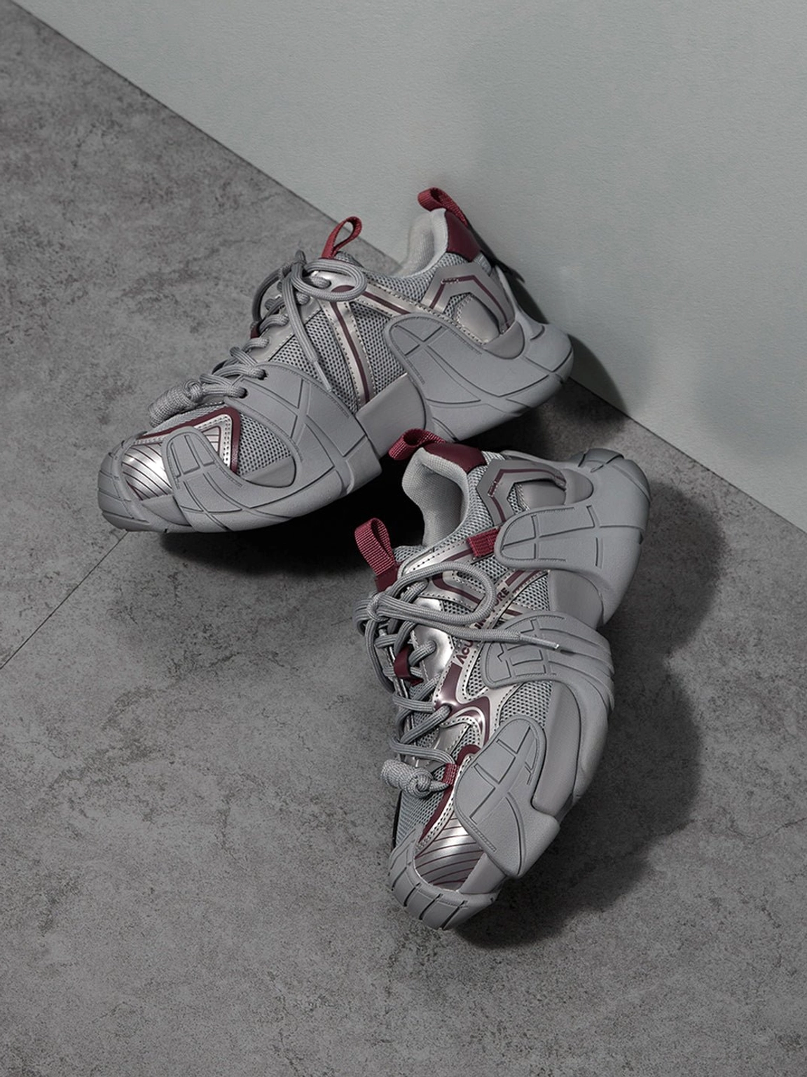 Silver cage panel chunky platform sneakers futuristic layered sneaker construction view