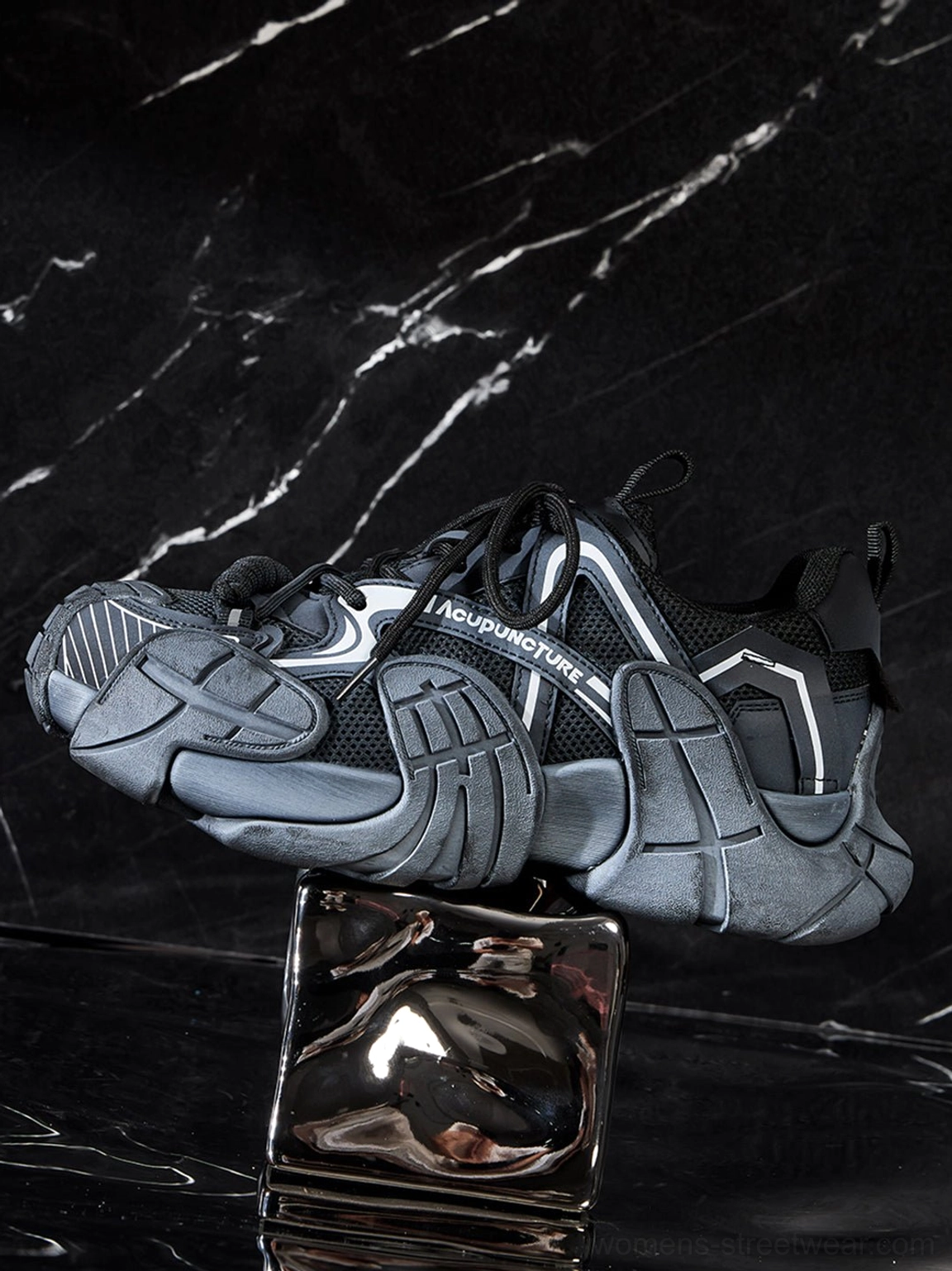 Side profile of silver cage panel chunky platform sneaker with sculpted segmented outsole