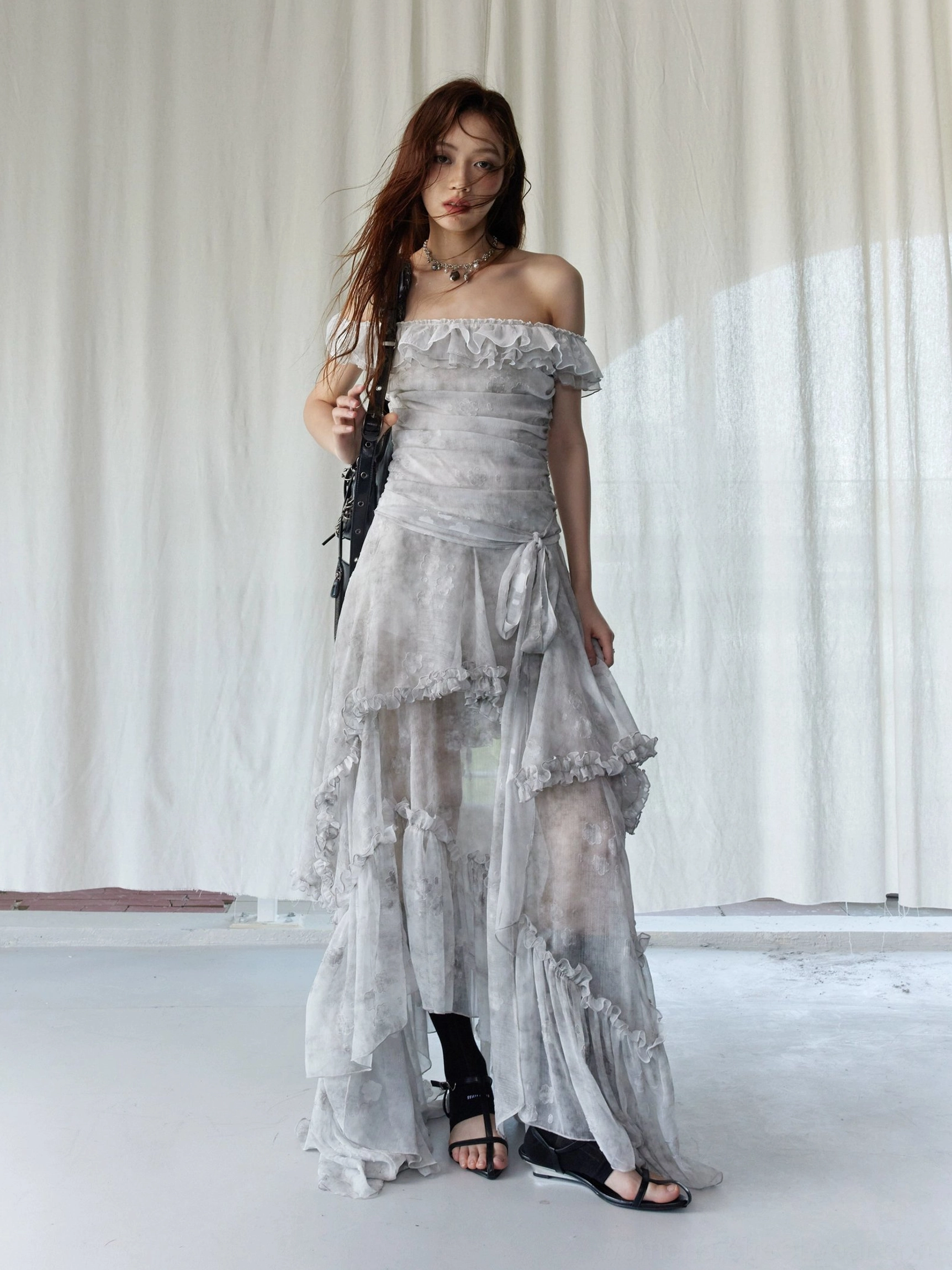 Silver gray tie-dye maxi dress with fitted ruched bodice, off-shoulder ruffle neckline, and layered sheer skirt