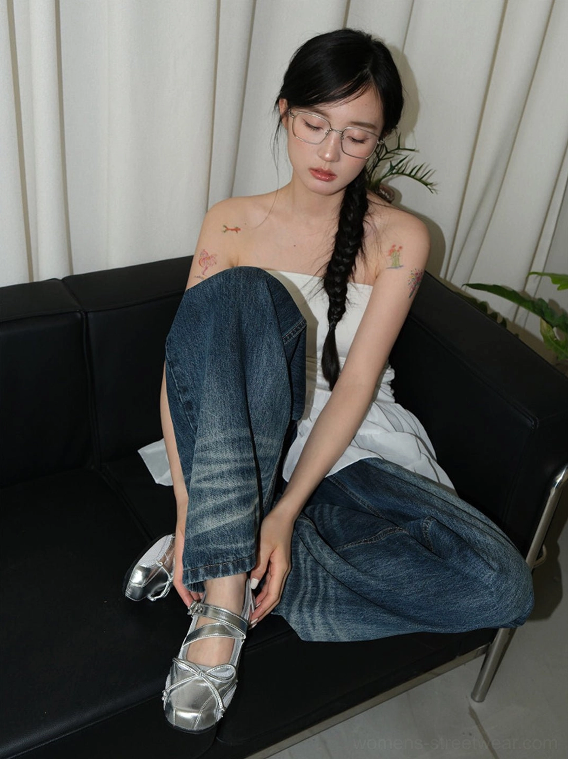 Silver leather-look Mary Jane bow flats with polished finish and buckle strap in a casual outfit