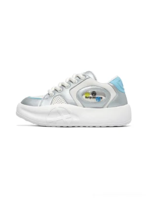 Silver metallic platform sneakers with light blue and white color-block details shown in a clean left side studio view