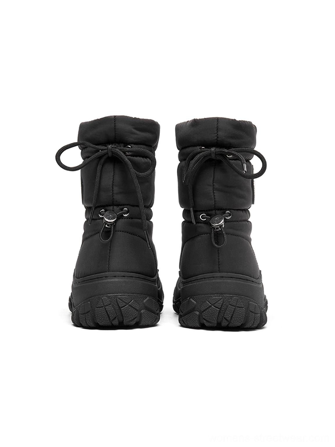 Silver metallic puffer snow boot detail for contemporary cold-weather streetwear and practical winter layering