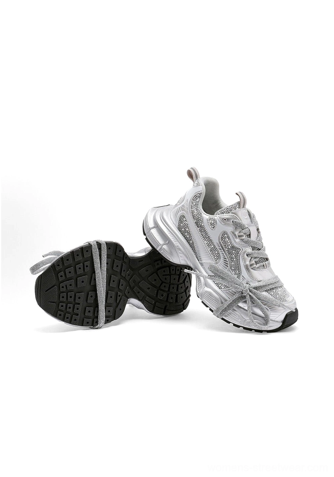 Silver rhinestone chunky dad sneaker showing the textured black rubber outsole, sparkling upper, and layered lace details