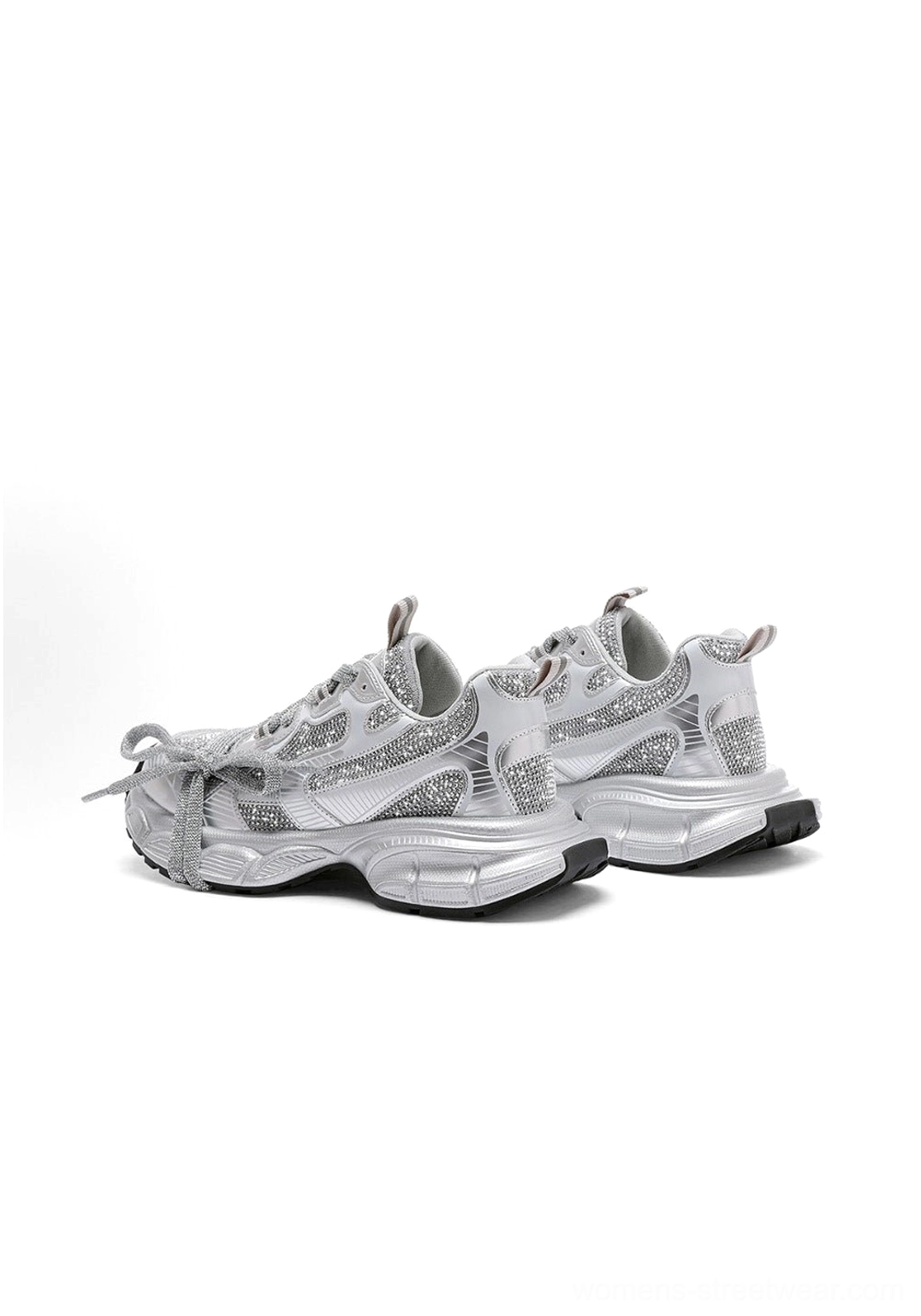 Rear three-quarter view of silver rhinestone chunky dad sneakers with heel pull tabs and a thick sculpted sole