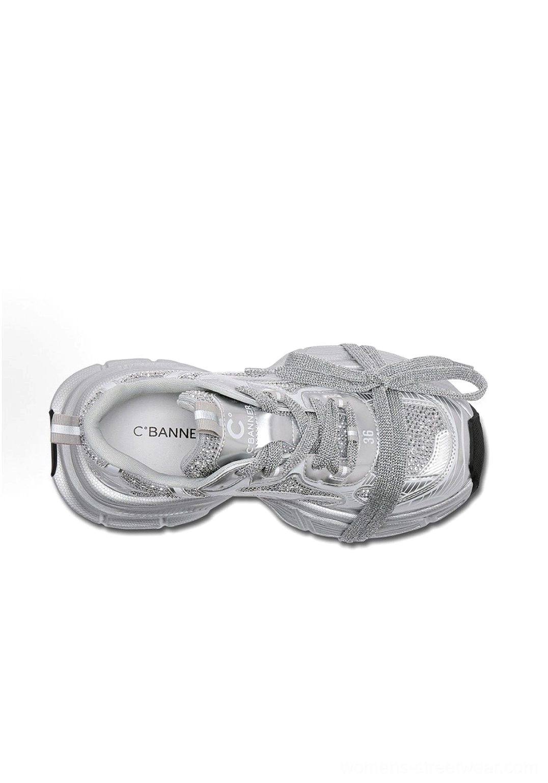 Top-down view of silver rhinestone chunky dad sneakers showing the sparkling laces, printed insole, and metallic inner lining