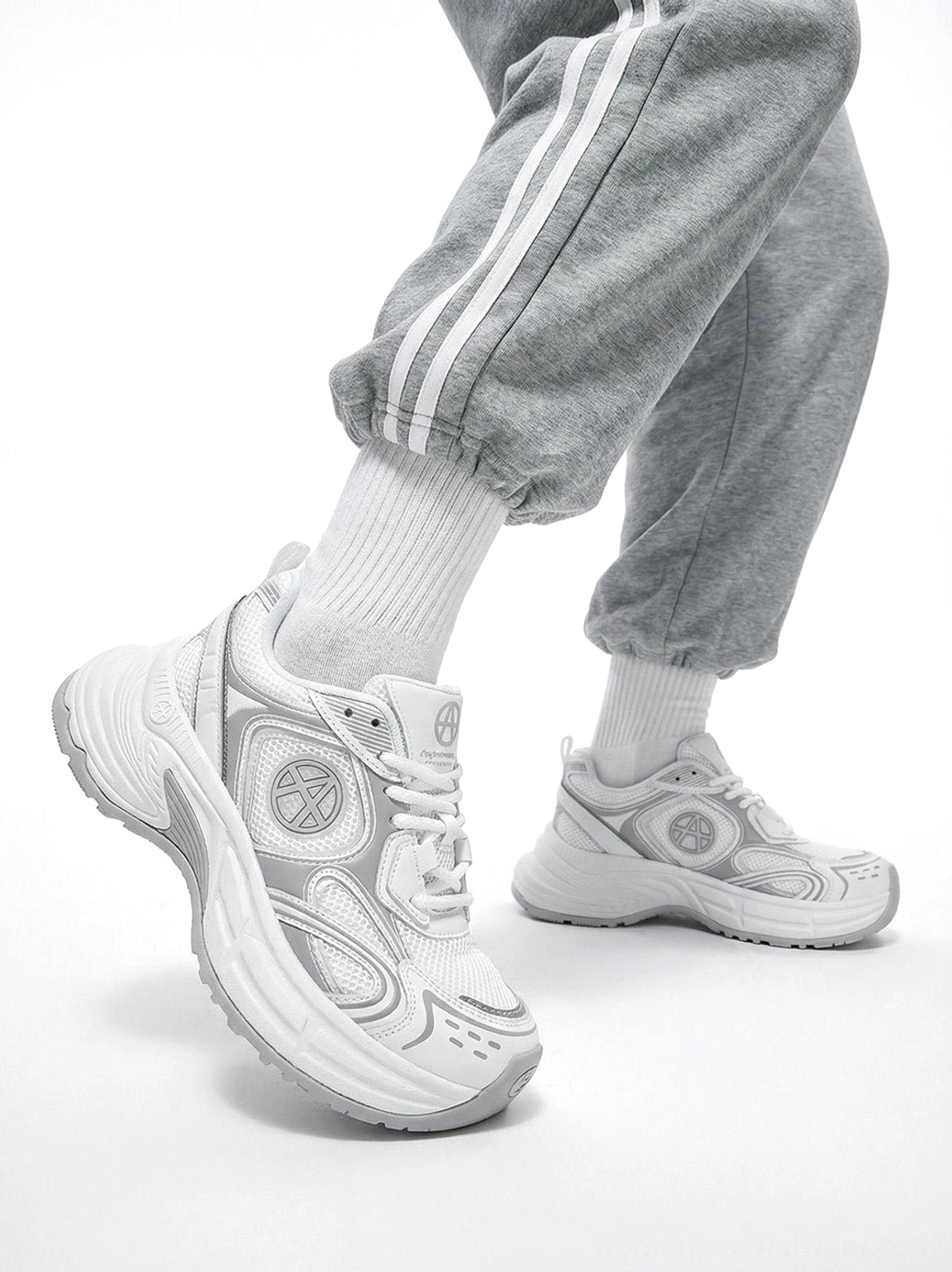 Silver Wave chunky dad sneakers showcasing a streamlined athletic profile and sculpted outsole for modern Acubi fashion looks