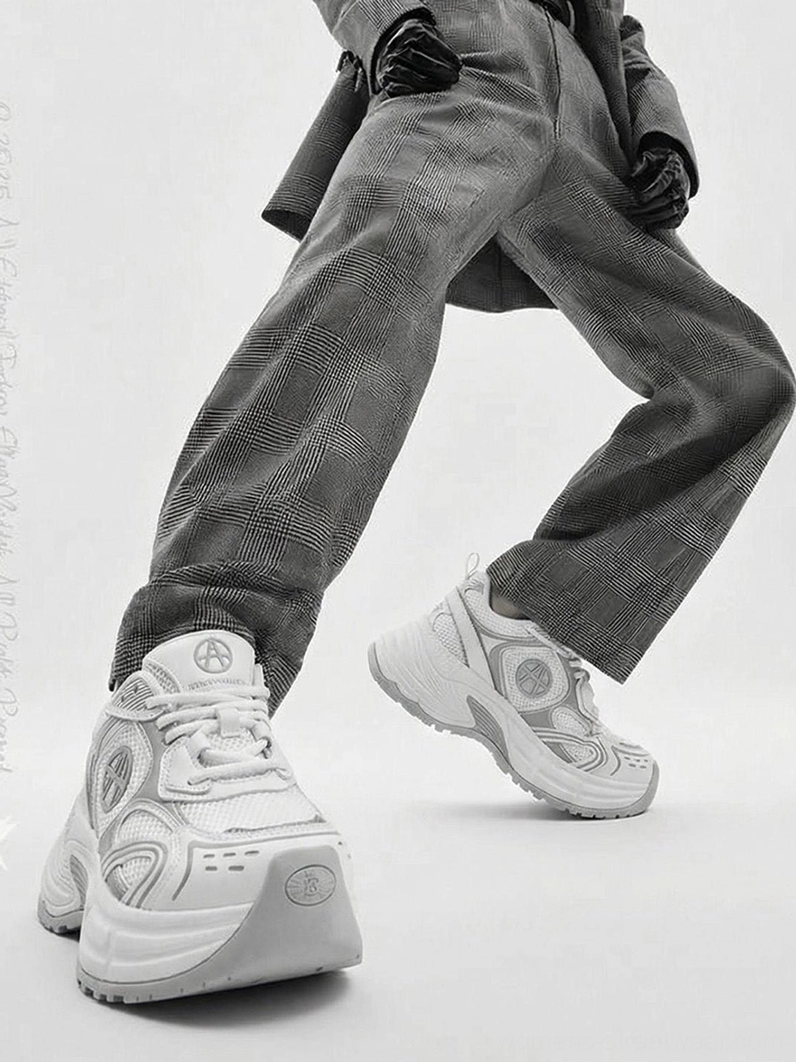 Silver Wave chunky dad sneakers featuring a reflective-inspired upper design and substantial sole for futuristic urban styling