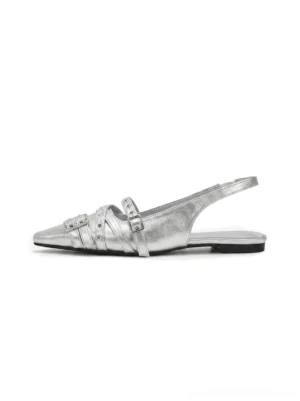 Silver pointed-toe double-buckle slingback flats with metallic finish, rivet accents, and low flat sole shown from the side