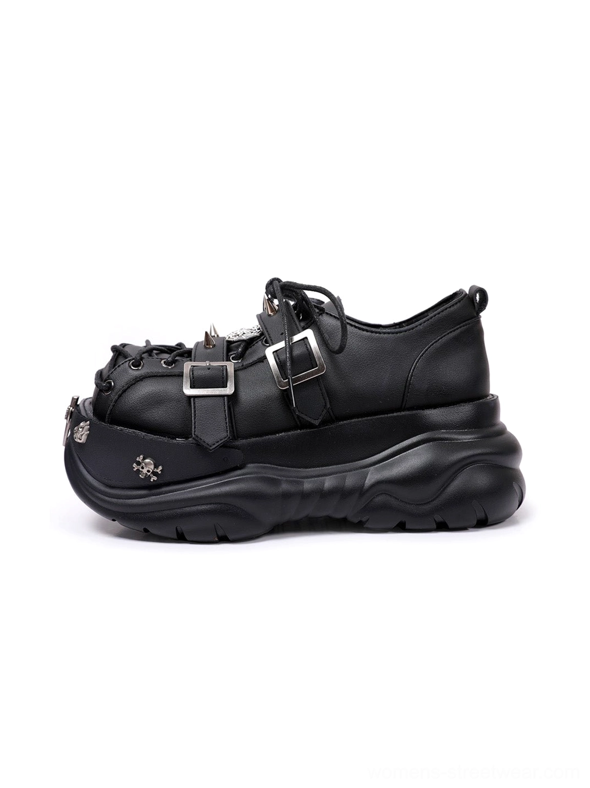 Single black chunky punk platform sneaker in side profile with double buckle straps, metal studs, curved platform sole, and lace-up closure
