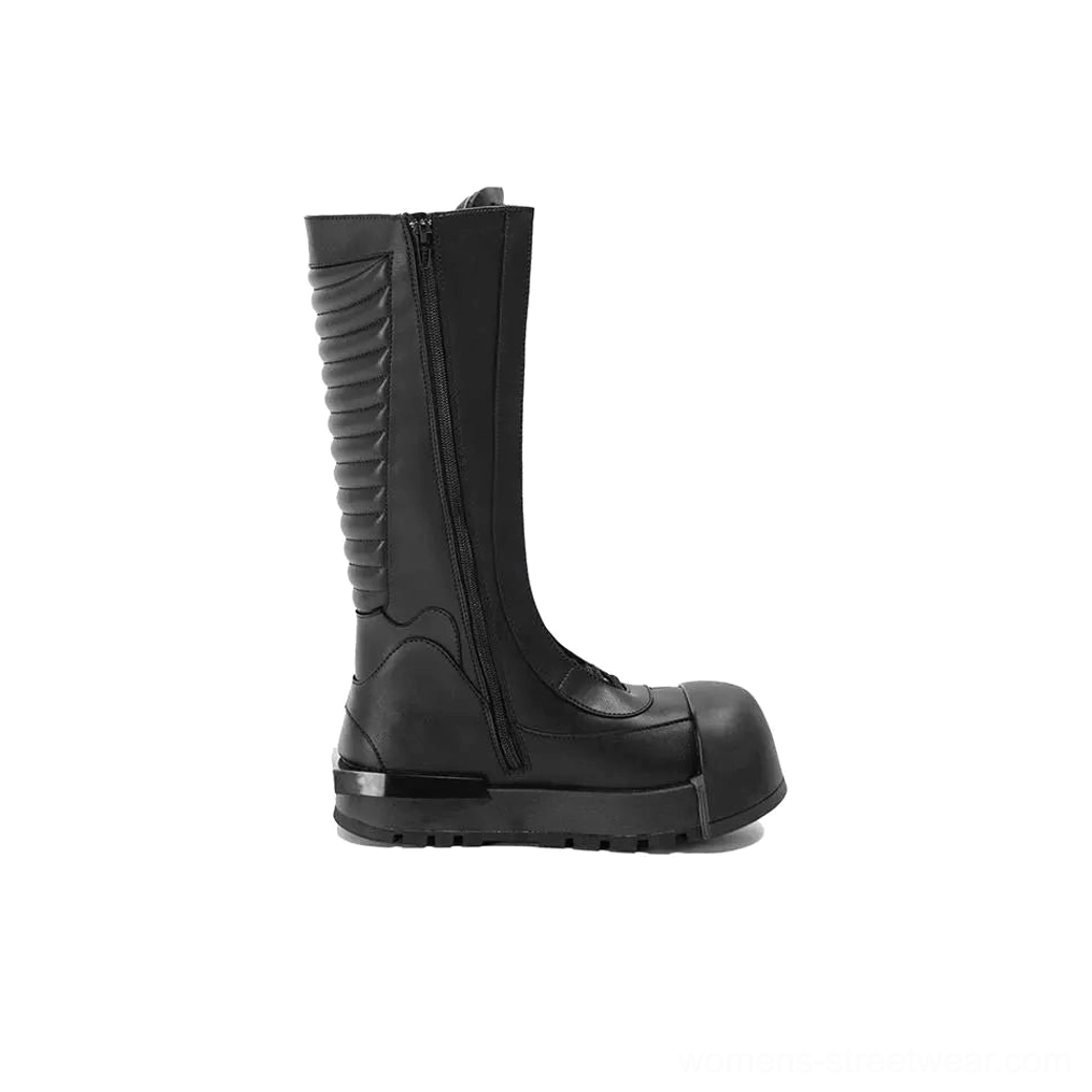 Single black knee-high platform combat boot shown from the side with ribbed shaft, inner zipper, rounded toe, and thick platform sole