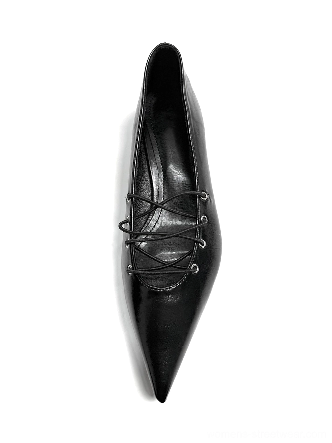 Single black pointed corset-lace ballet flat shown from a top three-quarter angle with glossy upper and metal eyelets
