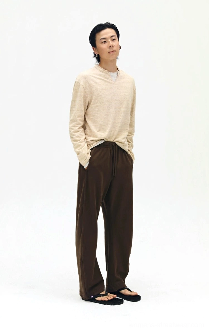 Size range display - XS to XL twill drawstring sweatpants showing fit options for all body types