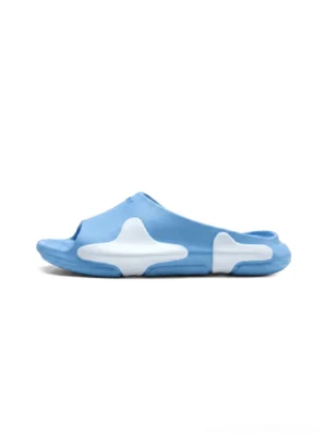 Sky blue cloud cushion open-toe streetwear slides in side profile on a clean white background