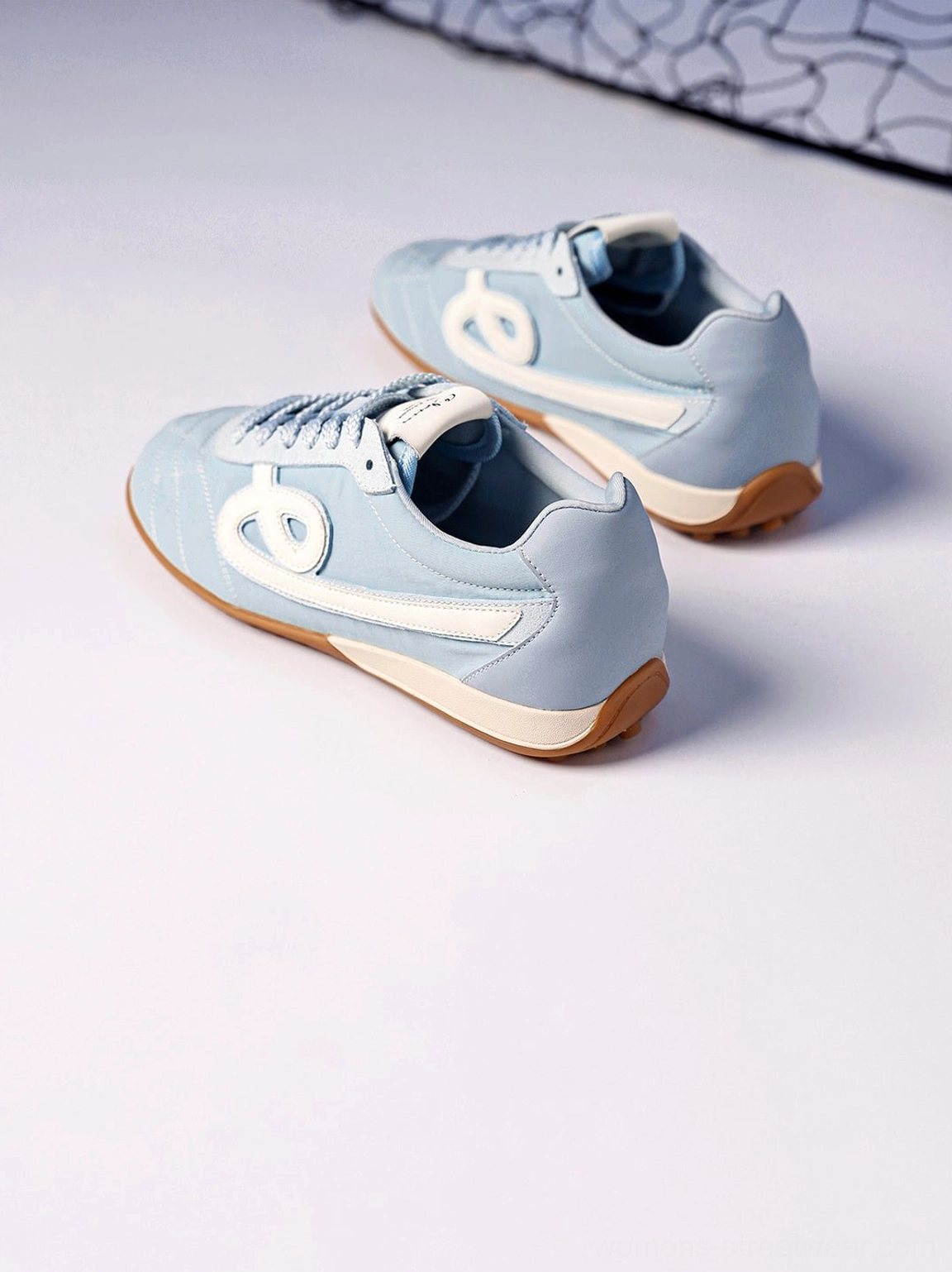 Sky blue quilted gum sole retro streetwear sneakers contrast side panel detail