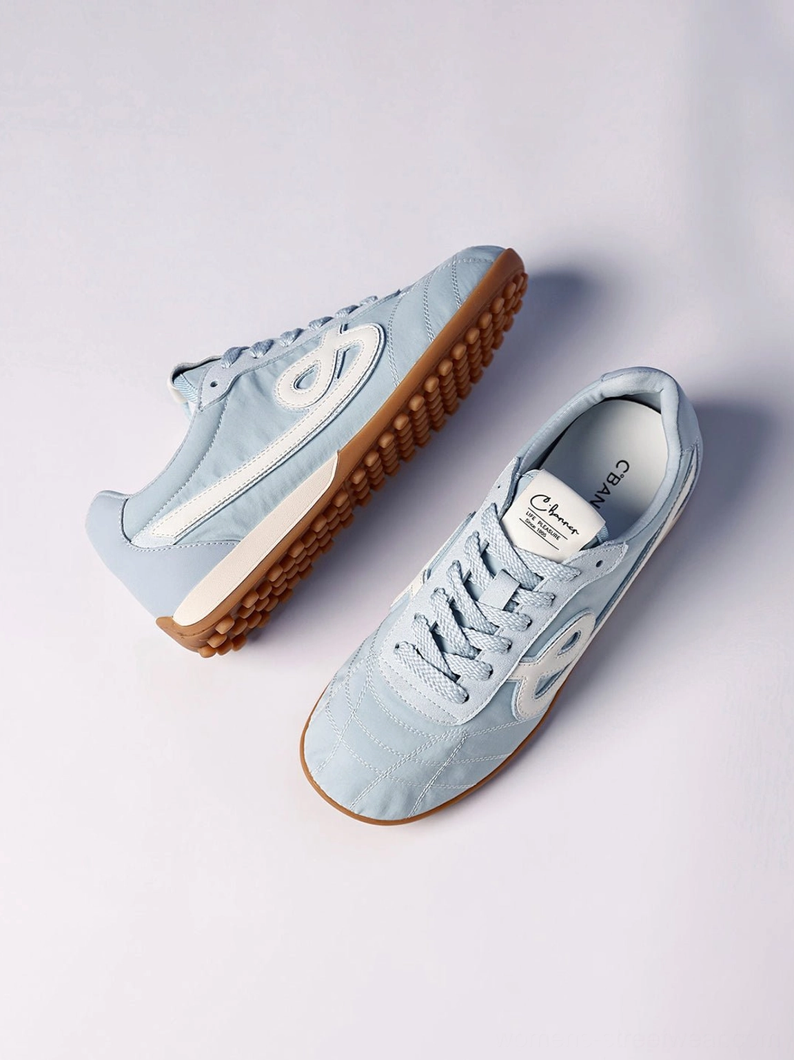 Sky blue quilted gum sole retro streetwear sneakers textured upper and laces detail