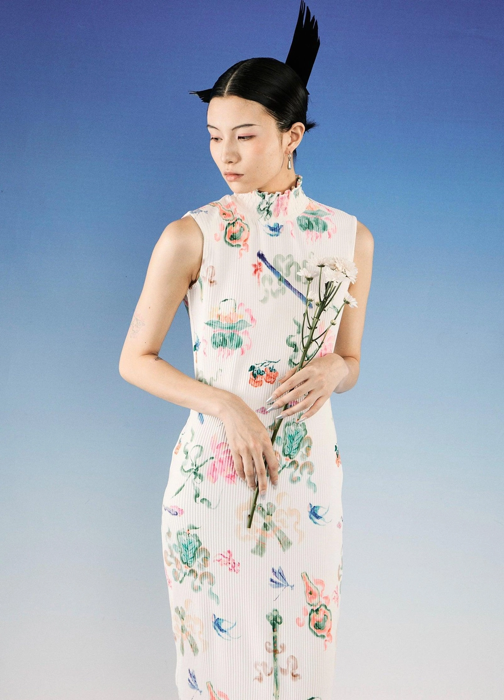 Front view of sleeveless floral qipao midi dress with fitted silhouette, stand collar, watercolor flower print, and white ribbed fabric