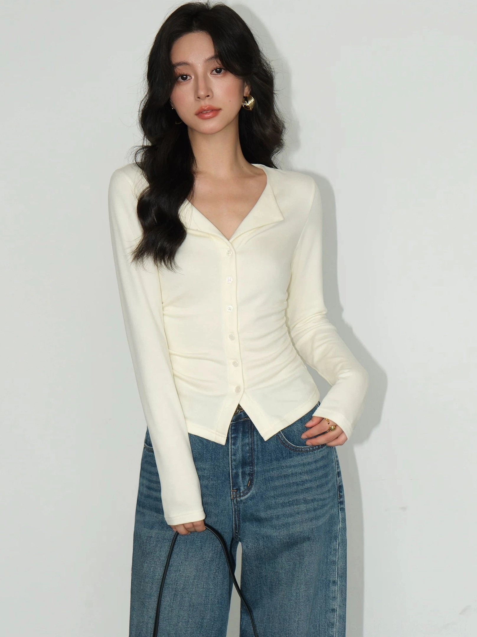 Light apricot fitted button-front cardigan top with tailored waist notched V-neck lapel and long sleeves