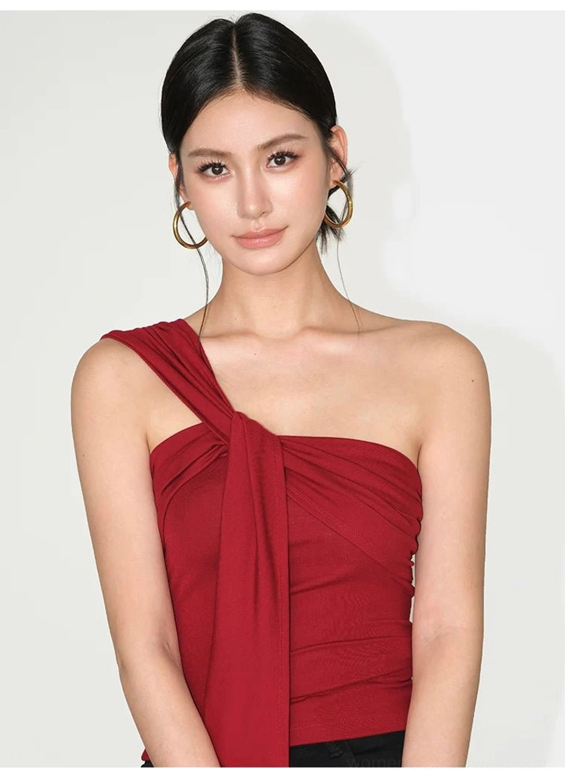 Slim fit stretch knit one-shoulder crop top with elegant draped detail for modern streetwear styling
