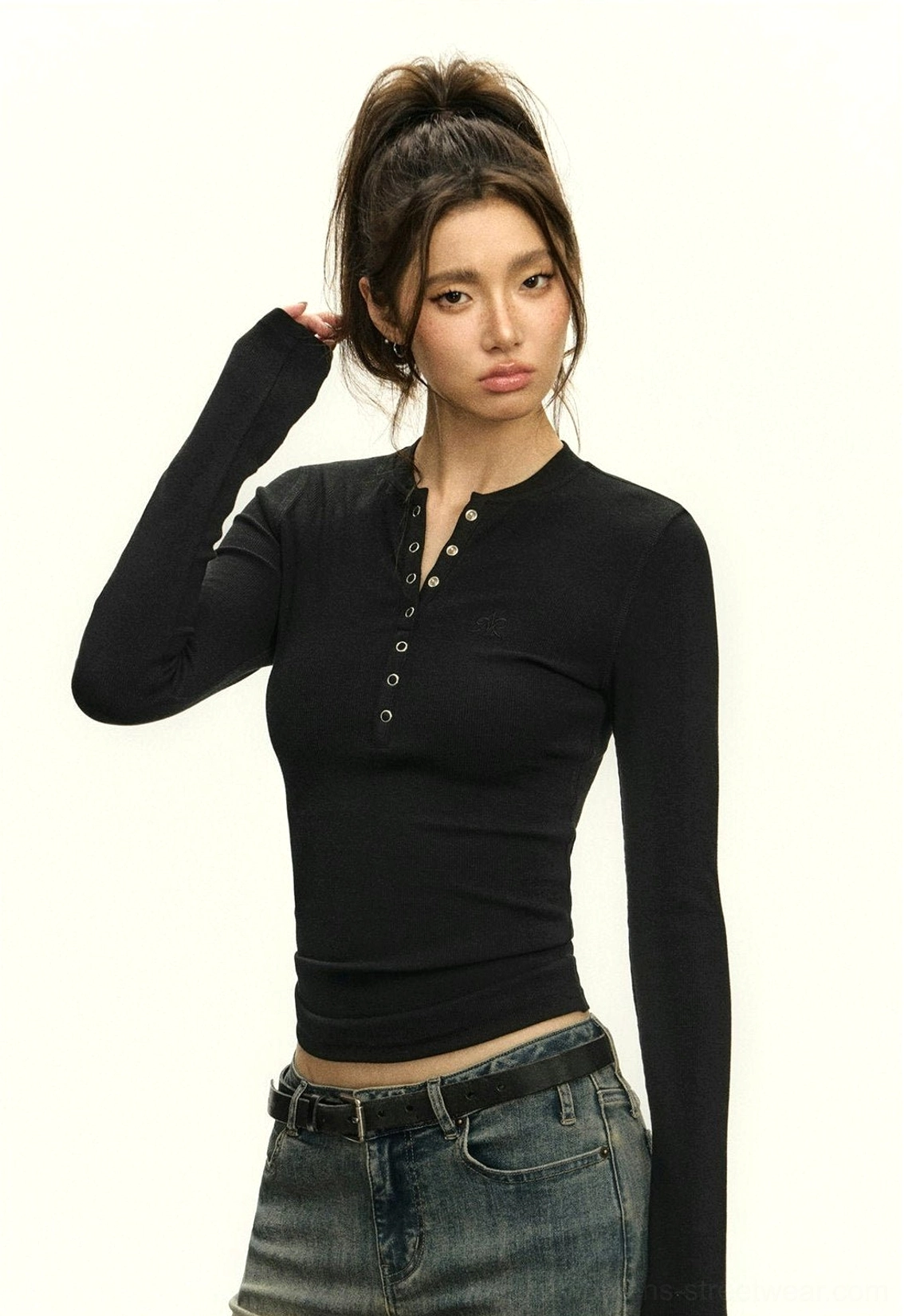 Slim-fit women's Henley crop top with long sleeves and clean minimalist silhouette for Seoul-inspired fashion