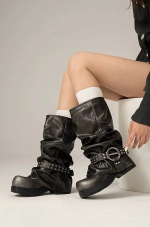 Smokestack rivet slouch platform biker boots front view showing dual buckle straps rivet hardware relaxed faux leather shaft and block platform heel