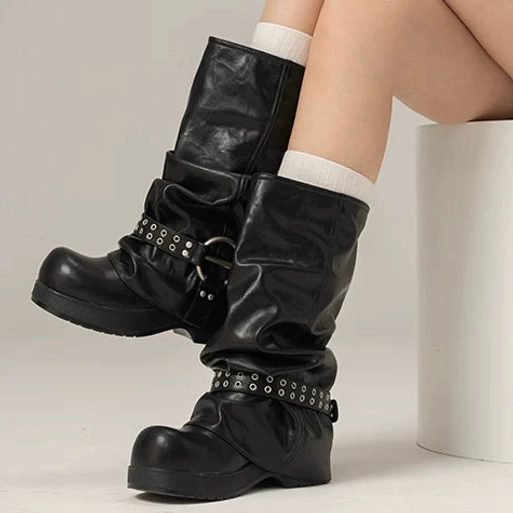 Retro black Smokestack rivet slouch platform biker boots pair with distressed black faux leather harness straps and chunky block heels