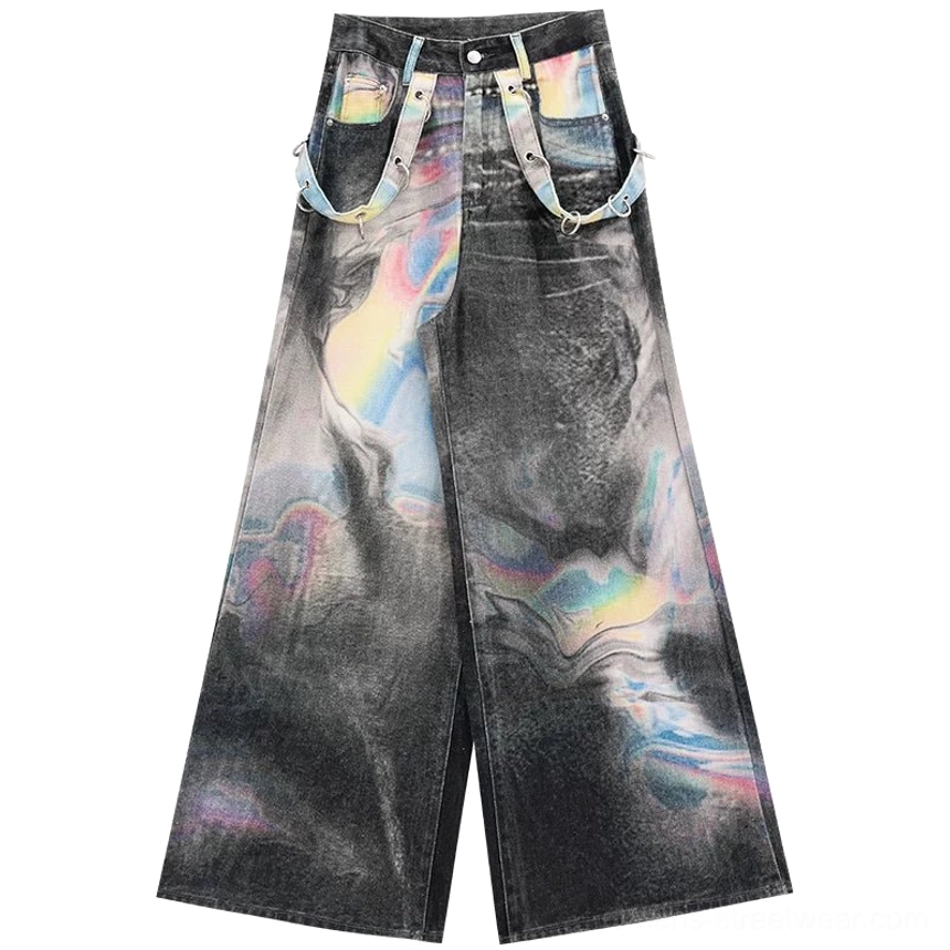 Flat lay of smoky black holographic marbled gradient wide-leg jeans with adjustable waist straps, classic pockets, and extra wide leg cut