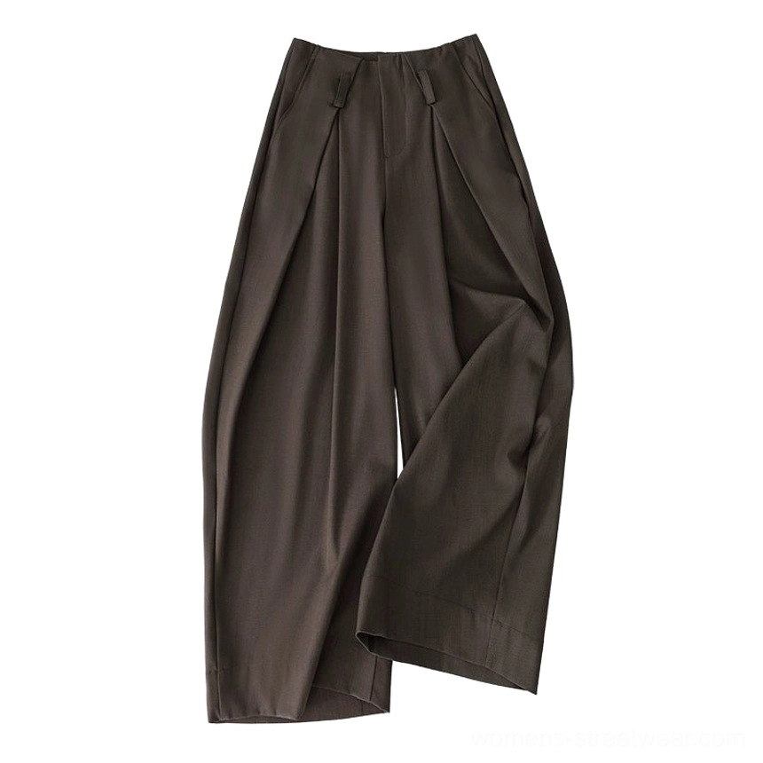 Smoky brown halter vest and matching wide-leg pants set with relaxed tailoring and vintage-inspired fashion