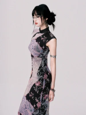 Three-quarter front side view of smoky purple patchwork cheongsam-inspired maxi dress showing ruched waist, black stand collar, and slim floor-length silhouette
