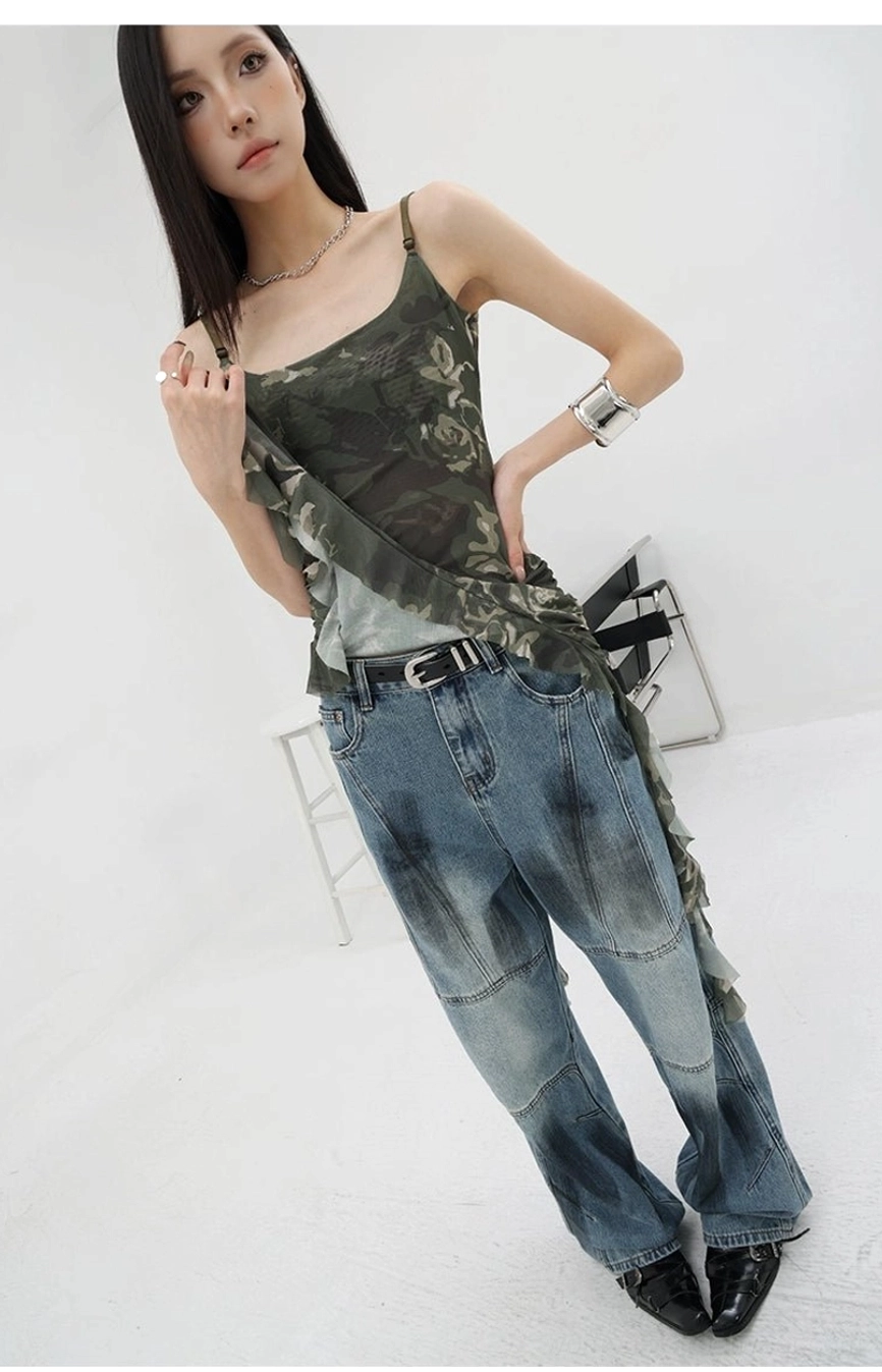 Snake print asymmetric ruffle tank paired with neutral styling showing how graphic pattern works with outfit combinations