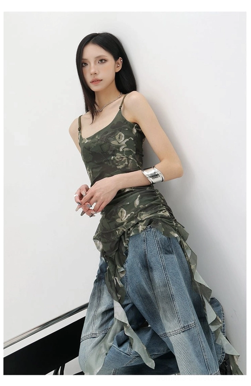 Snake print asymmetric ribbon tank detail showing graphic print texture quality and pattern definition on fabric