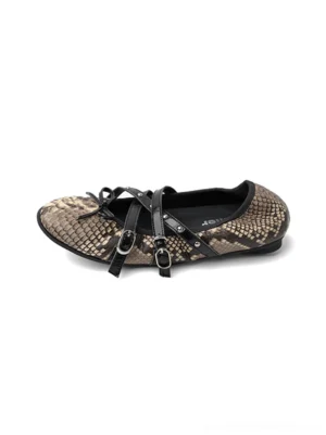 Snakeskin cross-strap ballet flats shown in overhead side view with black bow straps and metal buckle details