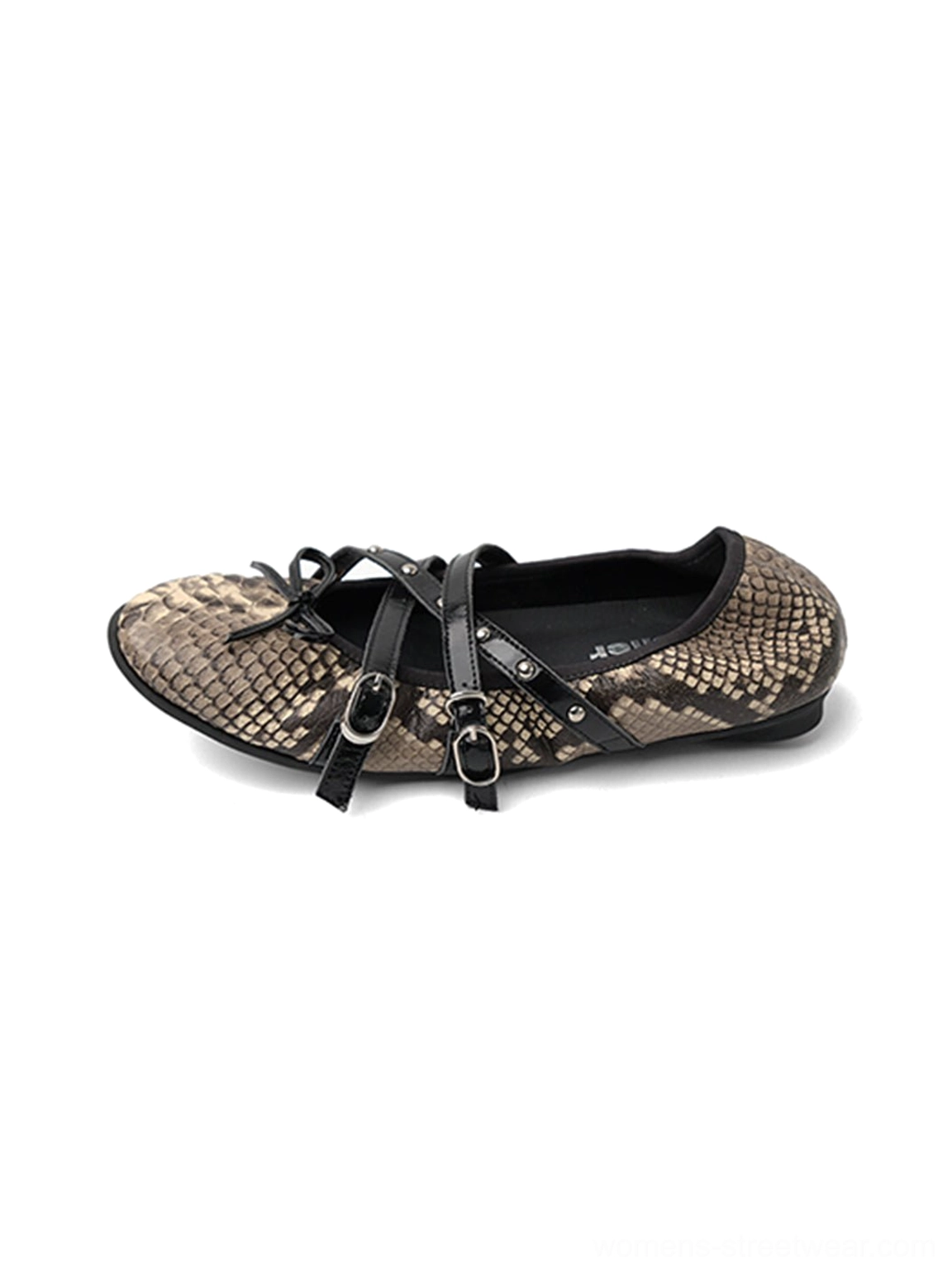 Snakeskin cross-strap ballet flats shown in overhead side view with black bow straps and metal buckle details