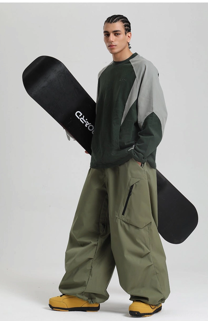 Snow pants model styling streetwear aesthetic winter outfit baggy fit functional fashion urban