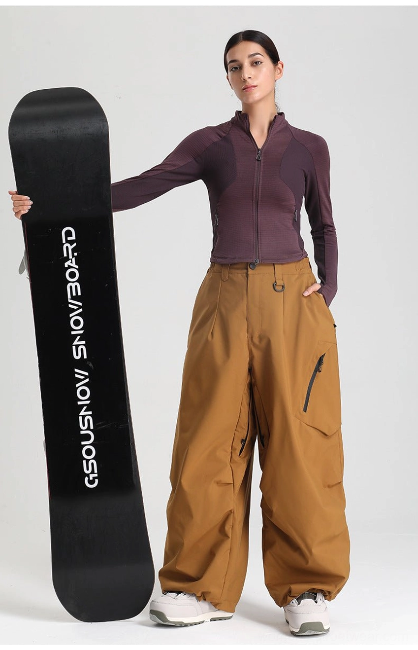 Wide-leg cargo snow pants styling inspiration layering bomber jacket streetwear look complete outfit
