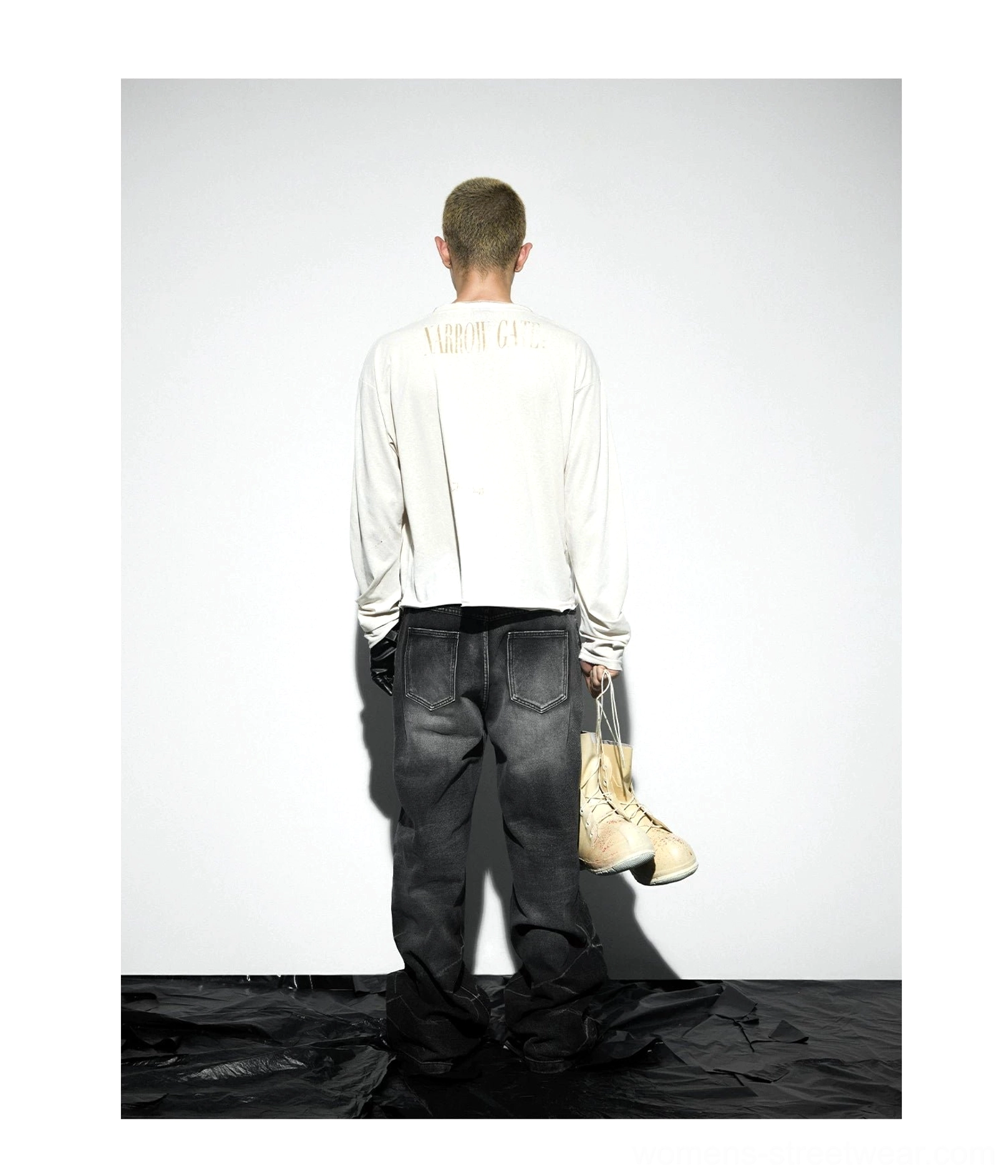 Full body back studio view of apricot snowfall scimitar sleeve long sleeve tee with relaxed oversized silhouette