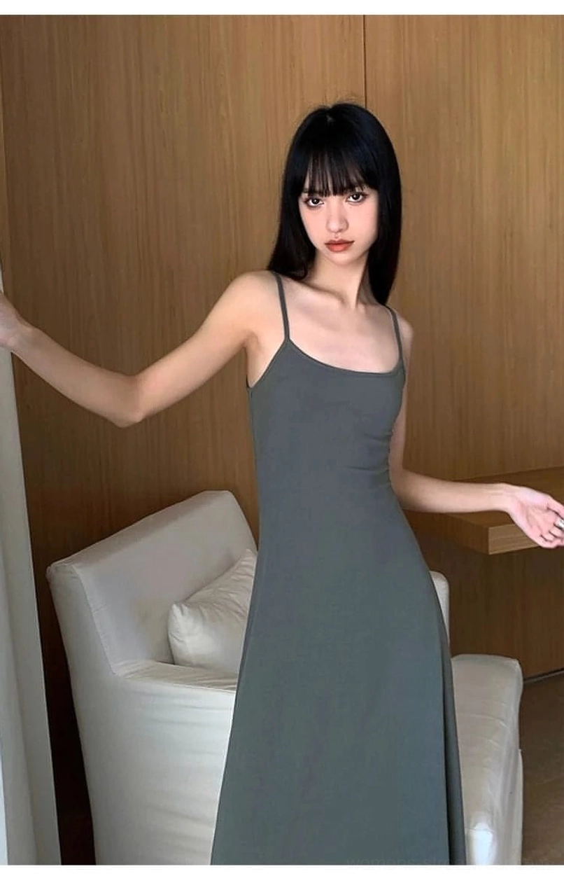 Soft cotton blend spaghetti strap maxi dress with a sleek silhouette for contemporary women's fashion