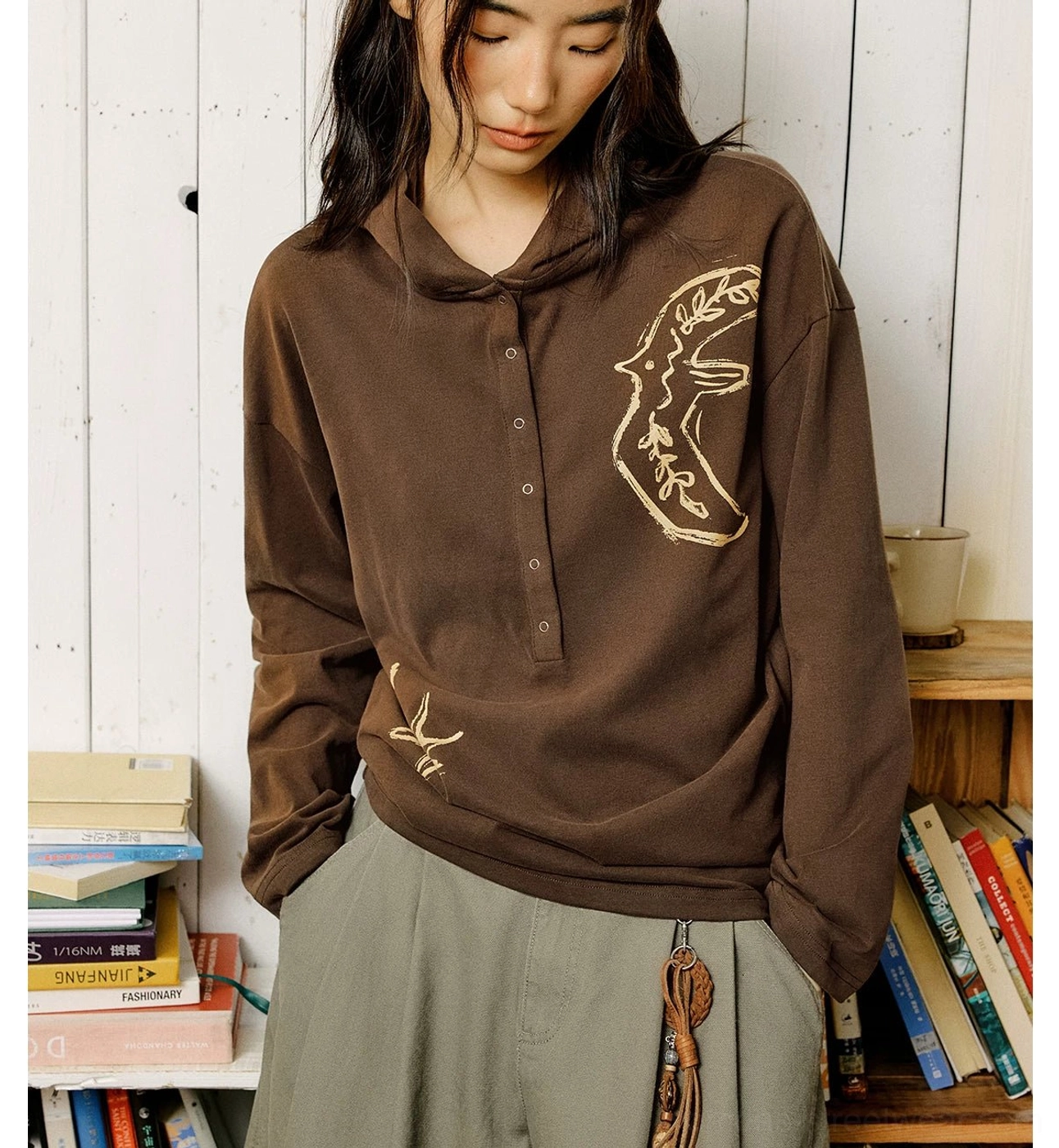 Soft cotton oversized embroidered polo top with relaxed proportions and a versatile half-button Henley front
