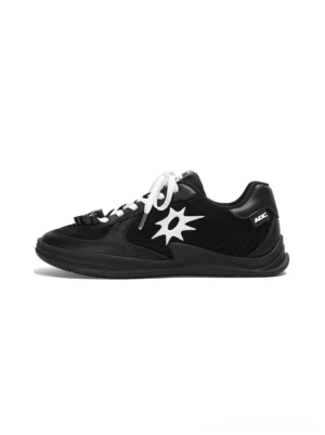 Black leather court sneaker with white solar star applique, white flat laces, and slim rubber outsole in a studio view