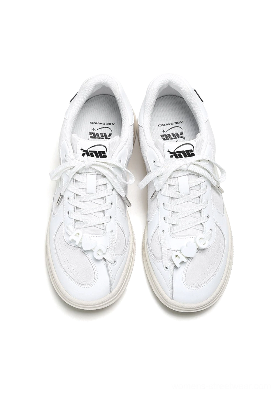 Solar Star Applique Black and White Leather Court Sneakers with white laces and monochrome streetwear color blocking