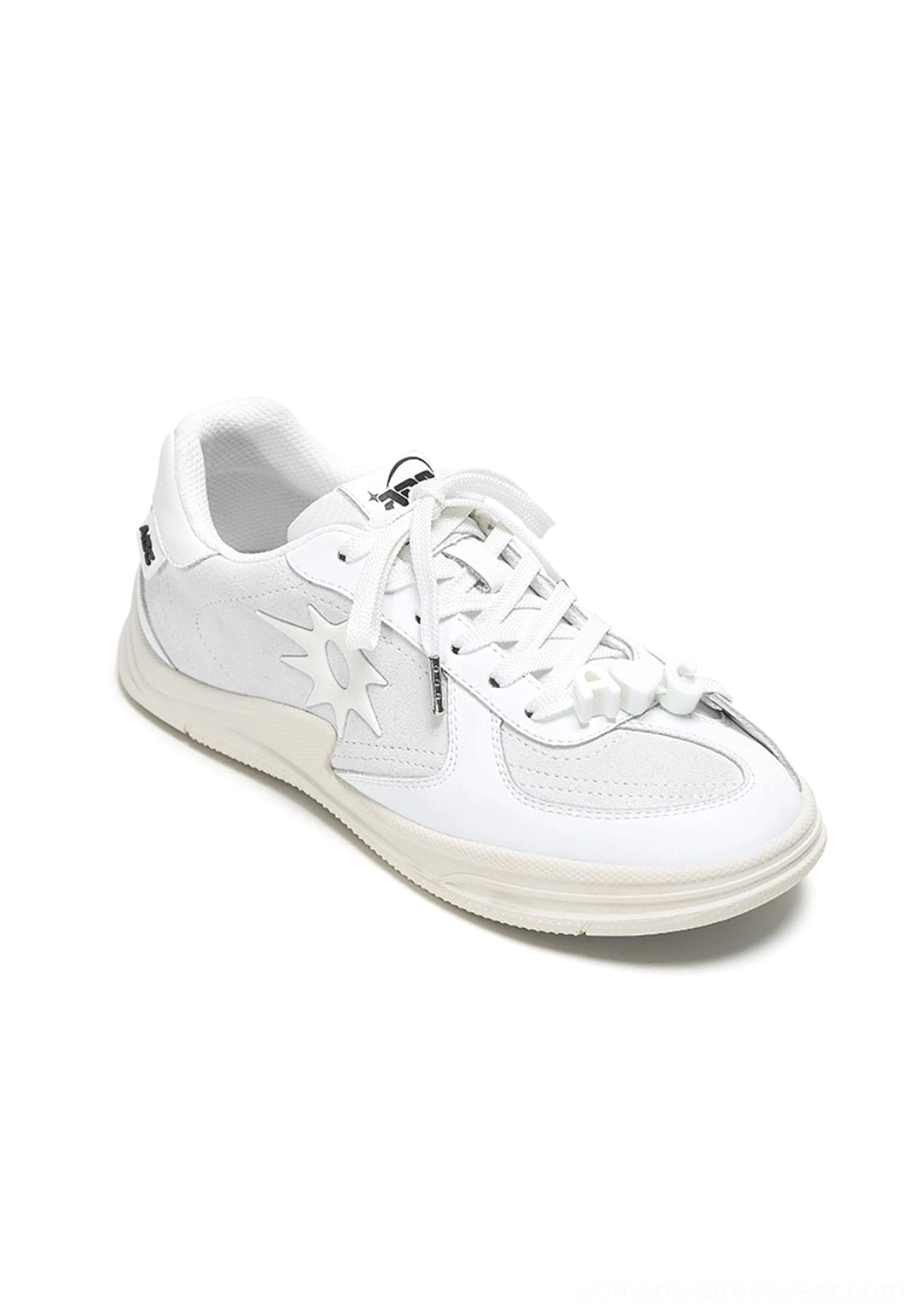 Solar Star Applique Black and White Leather Court Sneakers featuring a clean low-top profile and graphic star detail