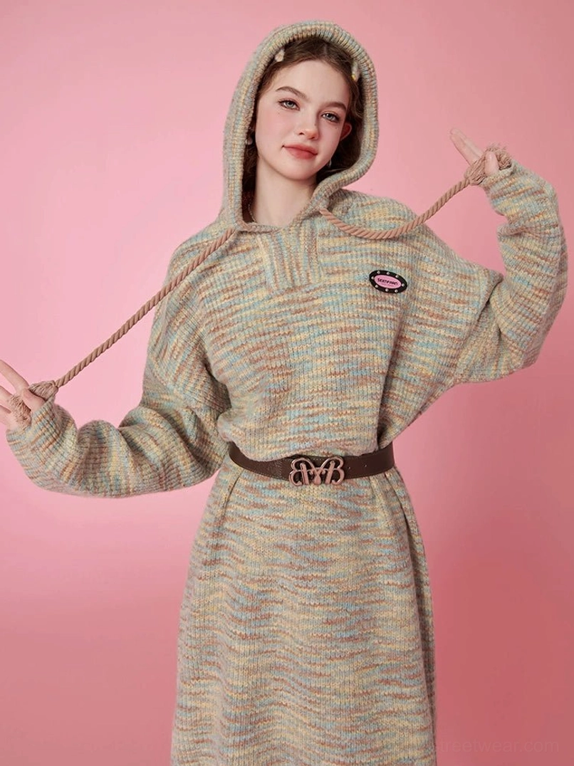 Front view of a loose space-dyed hooded knit midi sweater dress with long sleeves, adjustable drawstrings, and a casual Korean streetwear silhouette