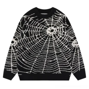 Black spider web jacquard knit sweater front view with white web pattern and ribbed crewneck
