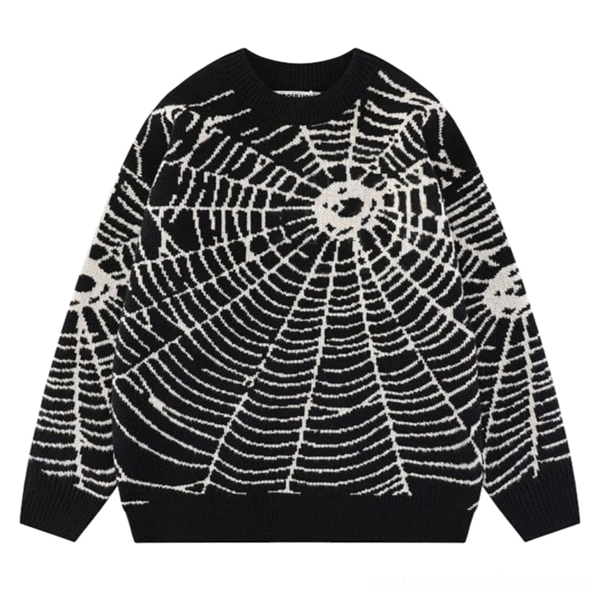 Black spider web jacquard knit sweater front view with white web pattern and ribbed crewneck