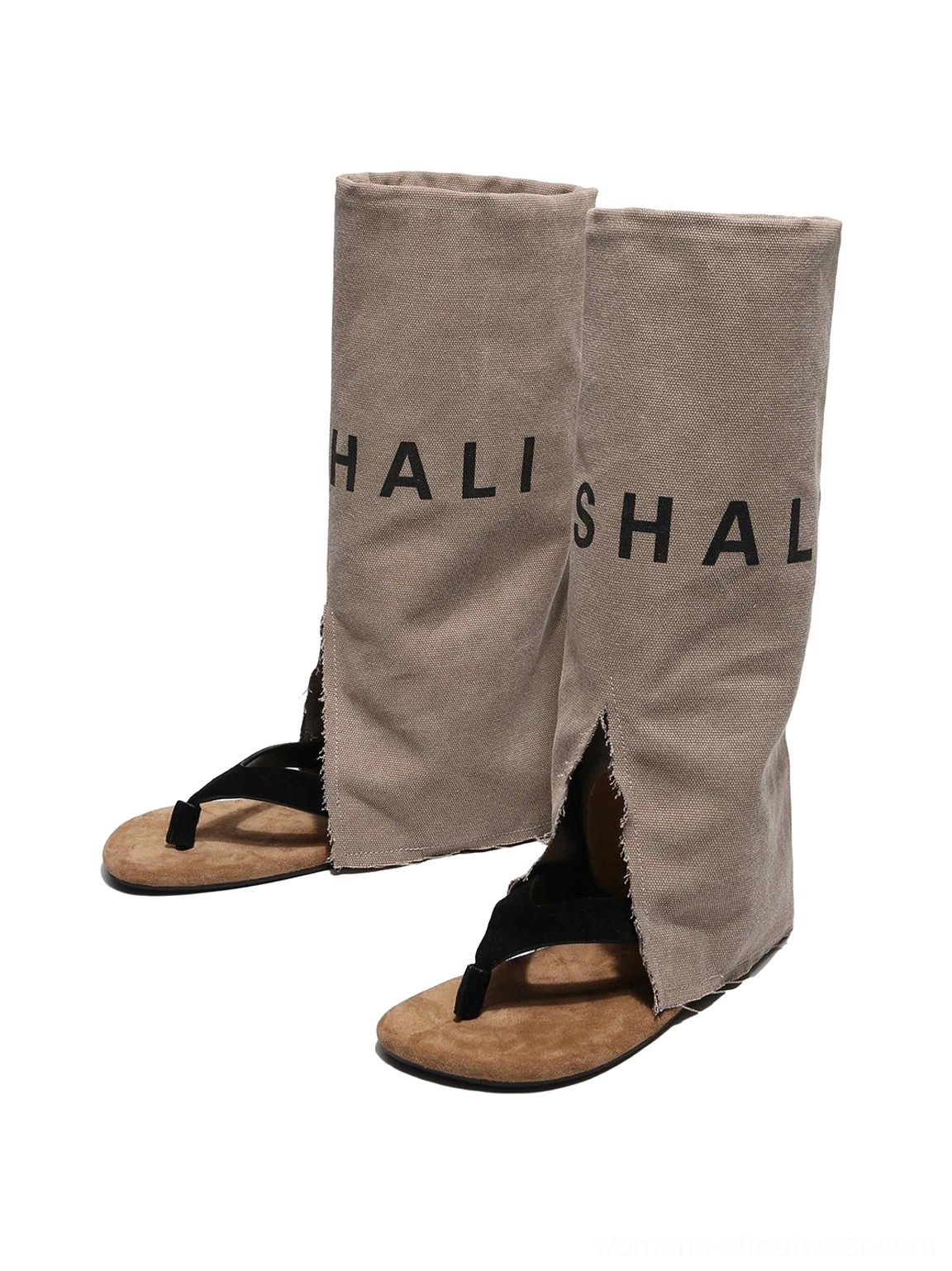 Split-toe khaki sandal boots with suede footbed, cowhide upper, fabric lining, and distinctive western-inspired design