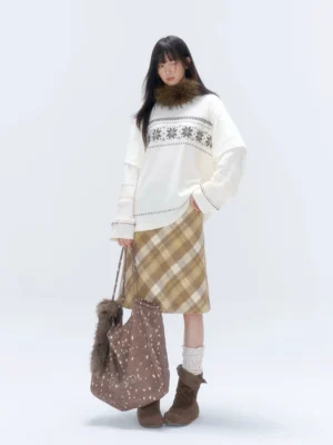 Female model wearing a winter casual outfit with a brown spotted deer faux fur trim rhinestone oversized streetwear tote bag