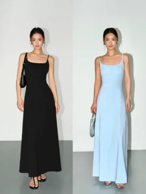 Black and light blue square neck knit maxi slip dresses shown on two models in a minimalist studio