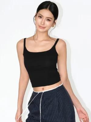 Black square neck ribbed cropped cami top styled with high waisted pinstripe wide leg pants front view