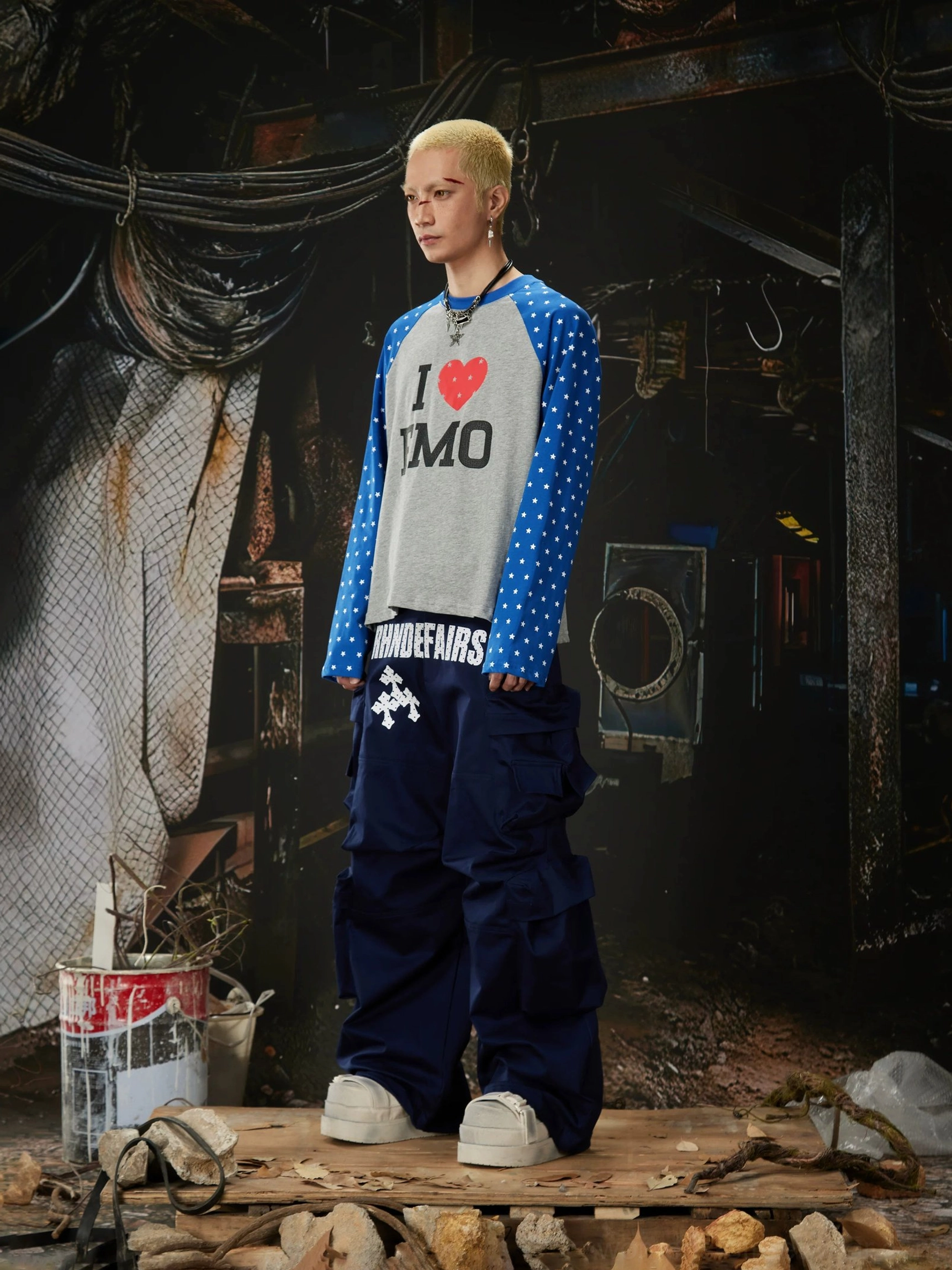 Stacked pocket wide-leg streetwear cargo pants detailed product view with relaxed utility-inspired construction